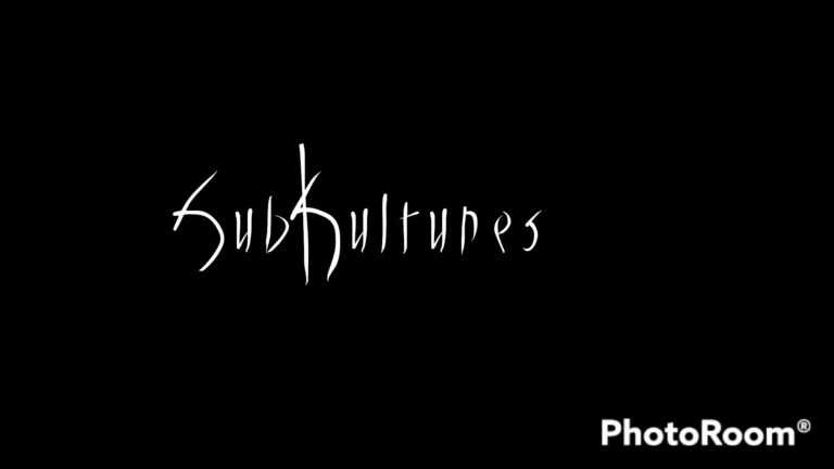 The text displays the words 'sukh kulnees', signifying an emporium, set against a vintage black backdrop.
