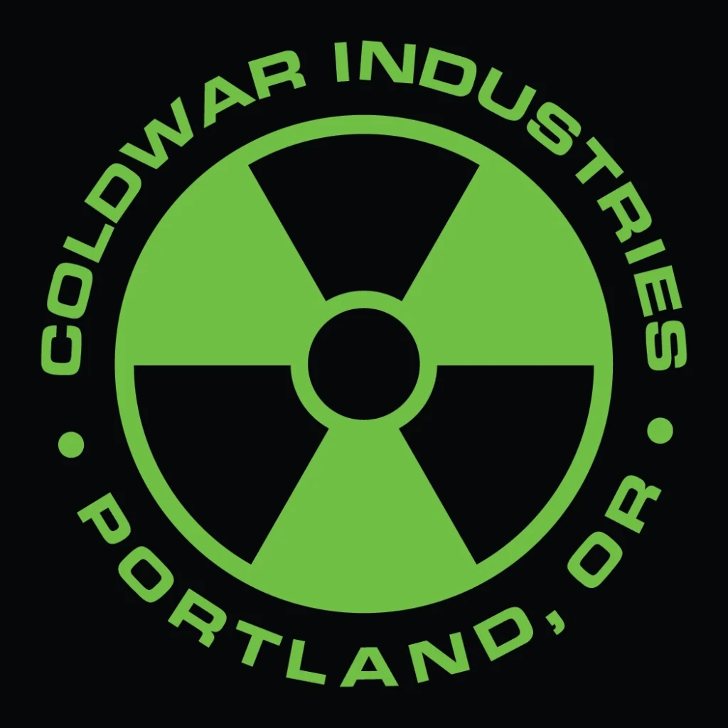Green radioactive symbol with "ColdWar Industries, LLC Portland, OR" text on a black background.