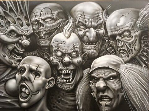 A group of seven creepy, zombie-like clown faces with exaggerated, grotesque features in black and white.