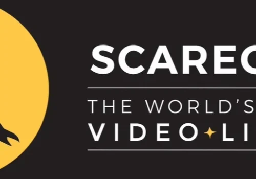Silhouette of a flying crow in a yellow circle next to text: "Scarecrow Video, the world’s largest video library.